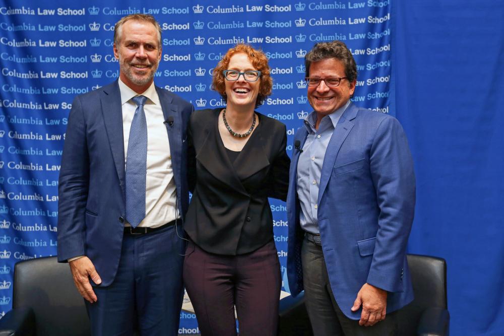 (Left to right) Professor Eric Talley, Dean Gillian Lester, and Mark L. Attanasio ’82.