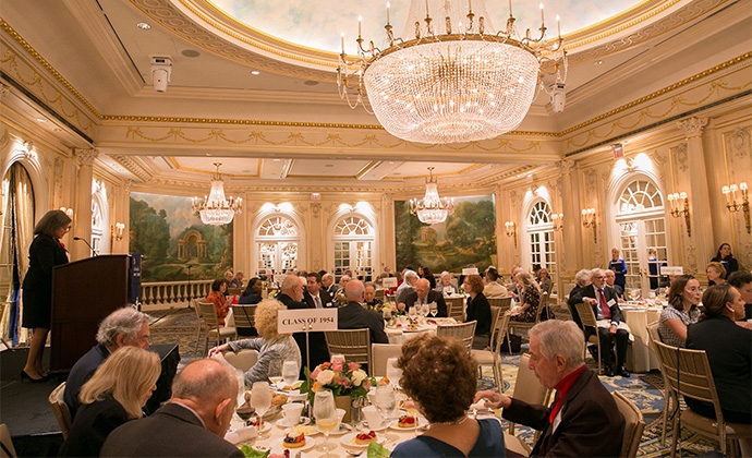 Susan Lindenauer '64 addresses luncheon attendees at the Essex House.